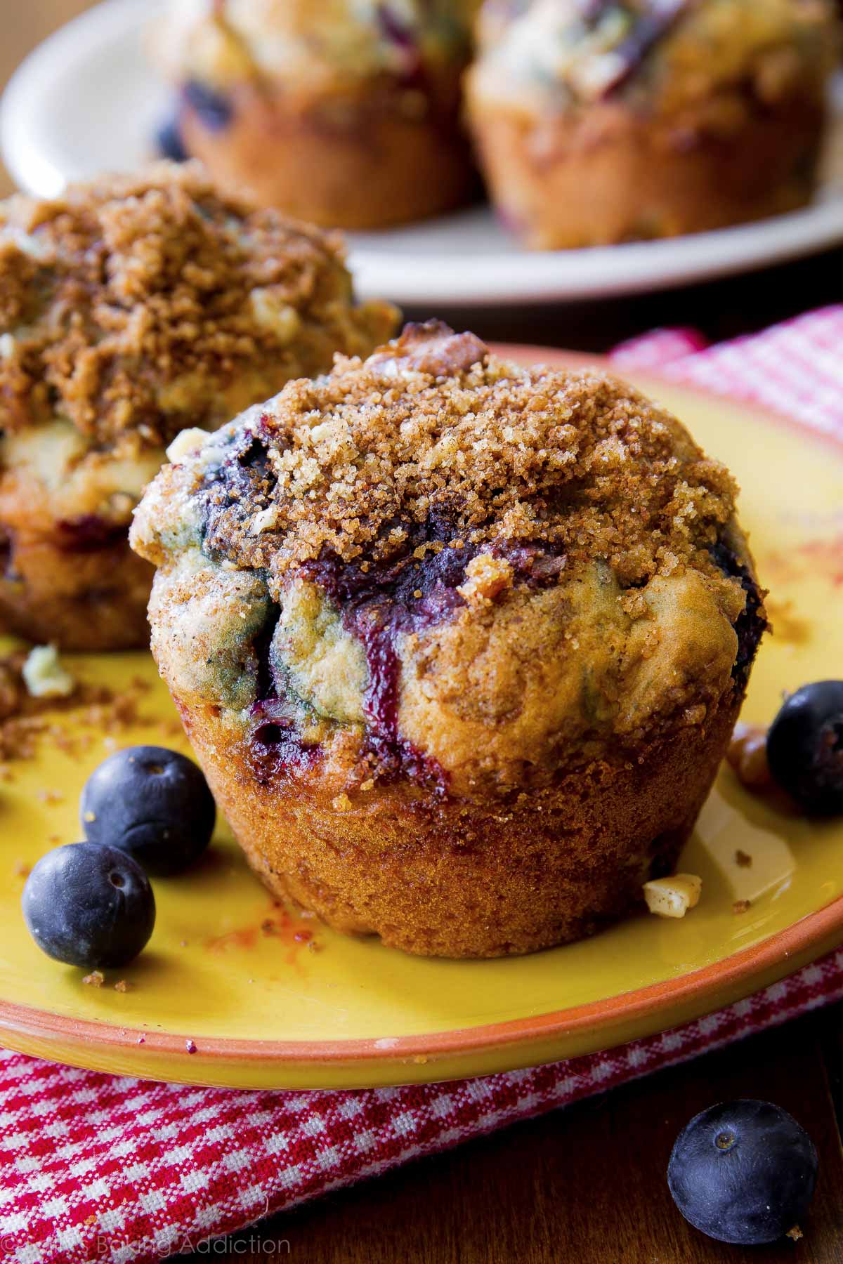 Blueberry muffins on yellow plate