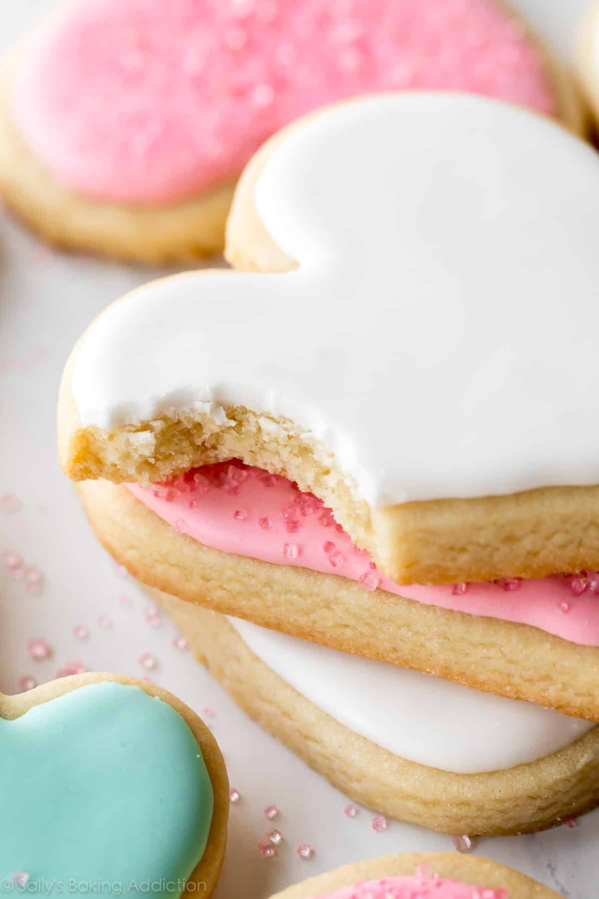 stack of decorated heart sugar cookies