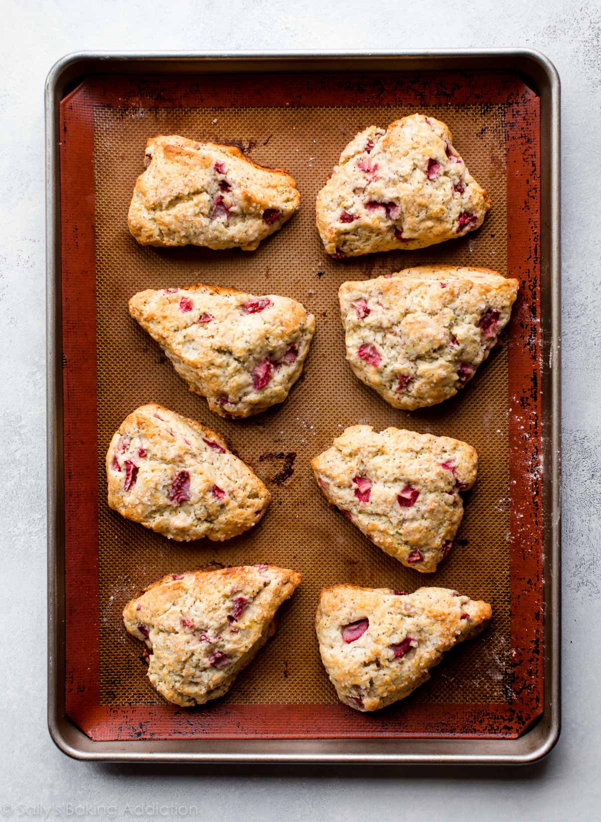 Strawberry scones on baking sheet