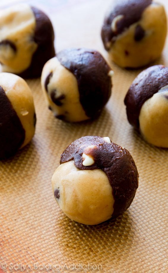 double chocolate chip swirl cookie dough balls on a silpat baking mat