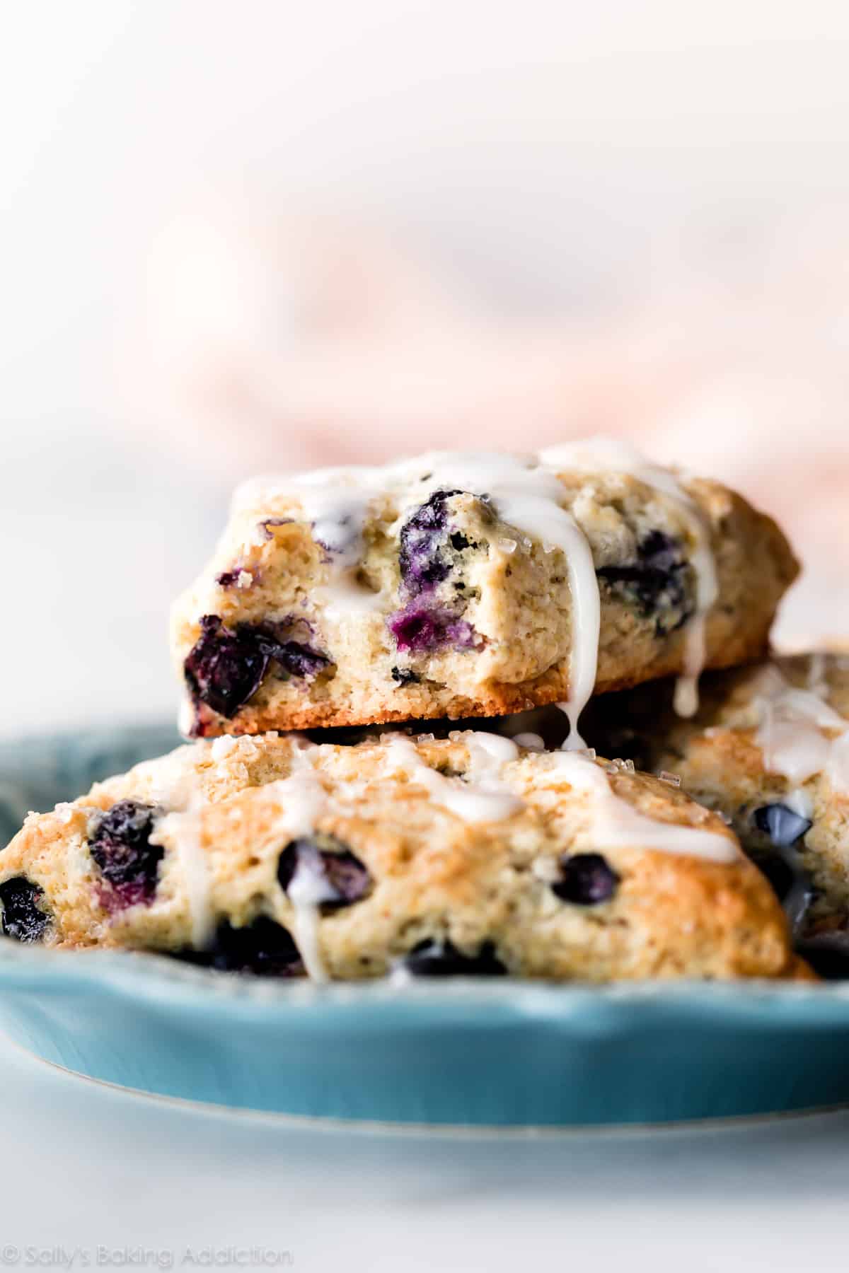 Blueberry scones on blue plate
