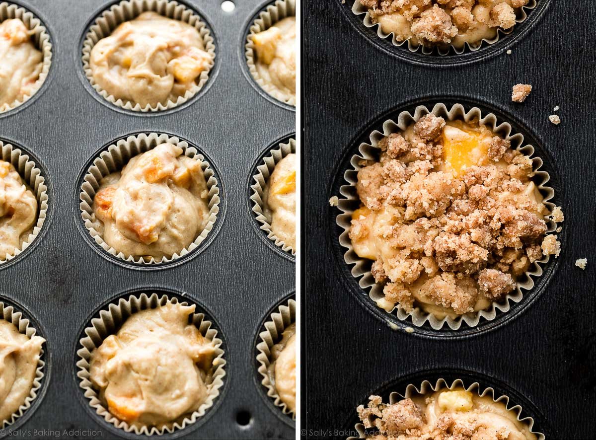 muffin batter with peaches and crumb topping pictured in muffin pan.