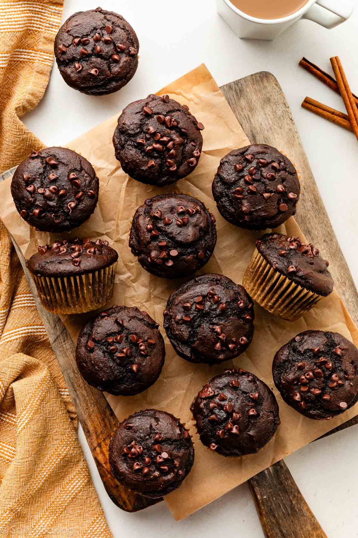 chocolate pumpkin muffins on a serving board.