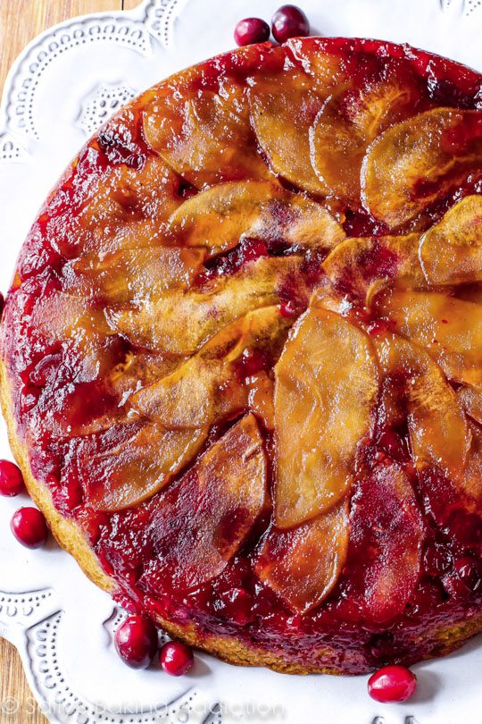cranberry apple upside down cake on a white plate