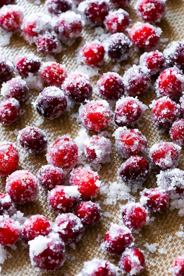 sugared cranberries on a baking sheet