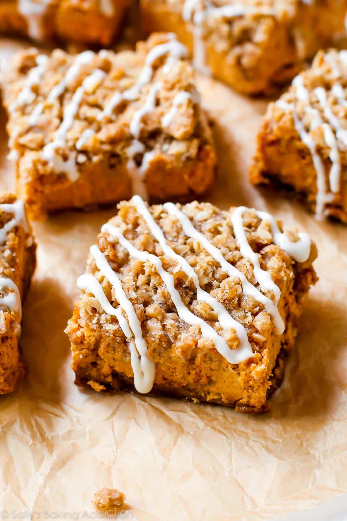 Instead of pumpkin pie this season, try my pumpkin streusel bars. With a gingersnap crust and brown sugar streusel topping, everyone will want seconds! sallysbakingaddiction.com