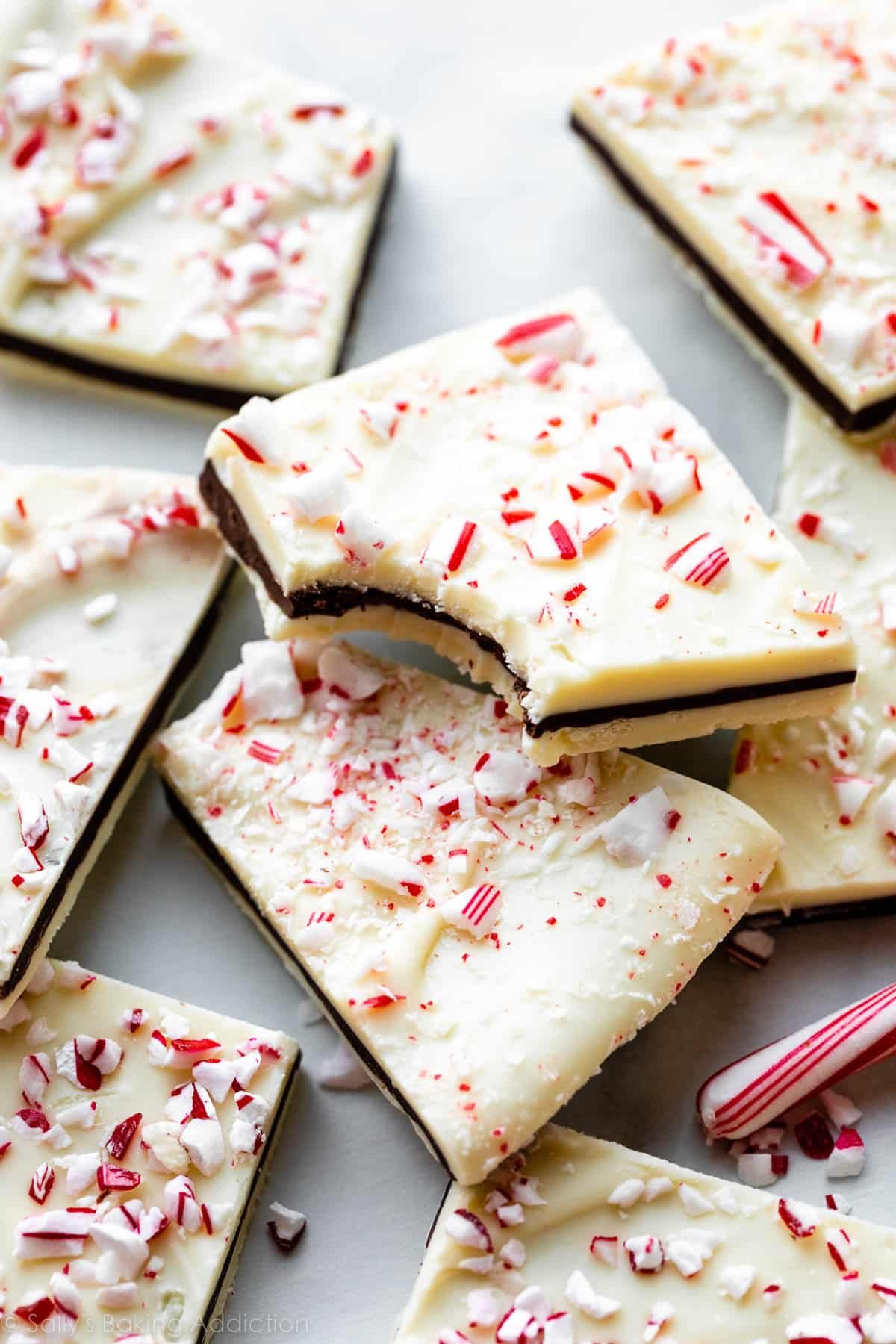 peppermint bark broken into pieces with crushed candy canes on top.