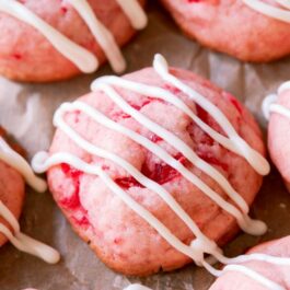 cherry almond shortbread cookies with white chocolate drizzle