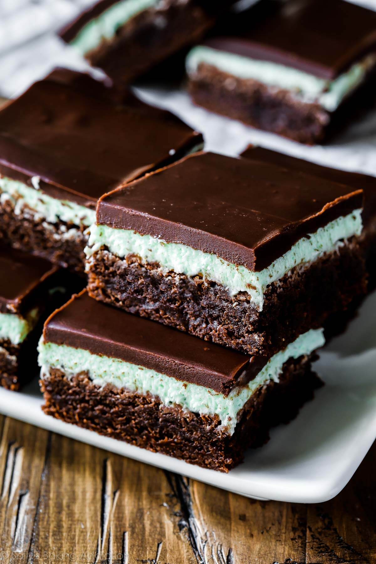 mint chocolate brownies on a white serving tray