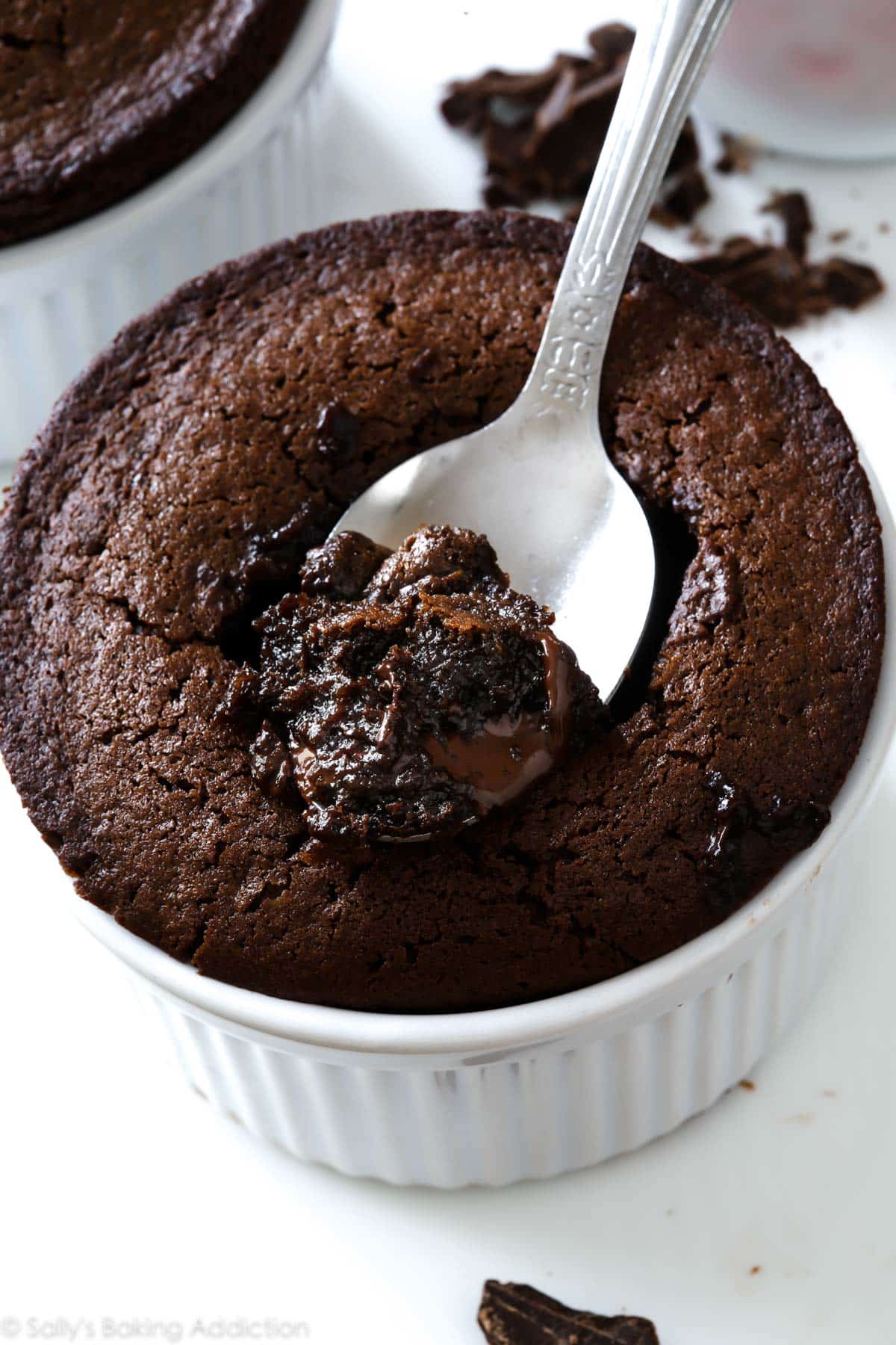 chocolate fudge cake with a silver spoon