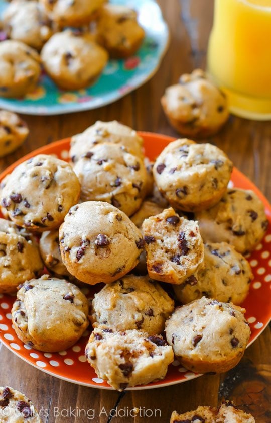 mini chocolate chip muffins on an orange and white plate
