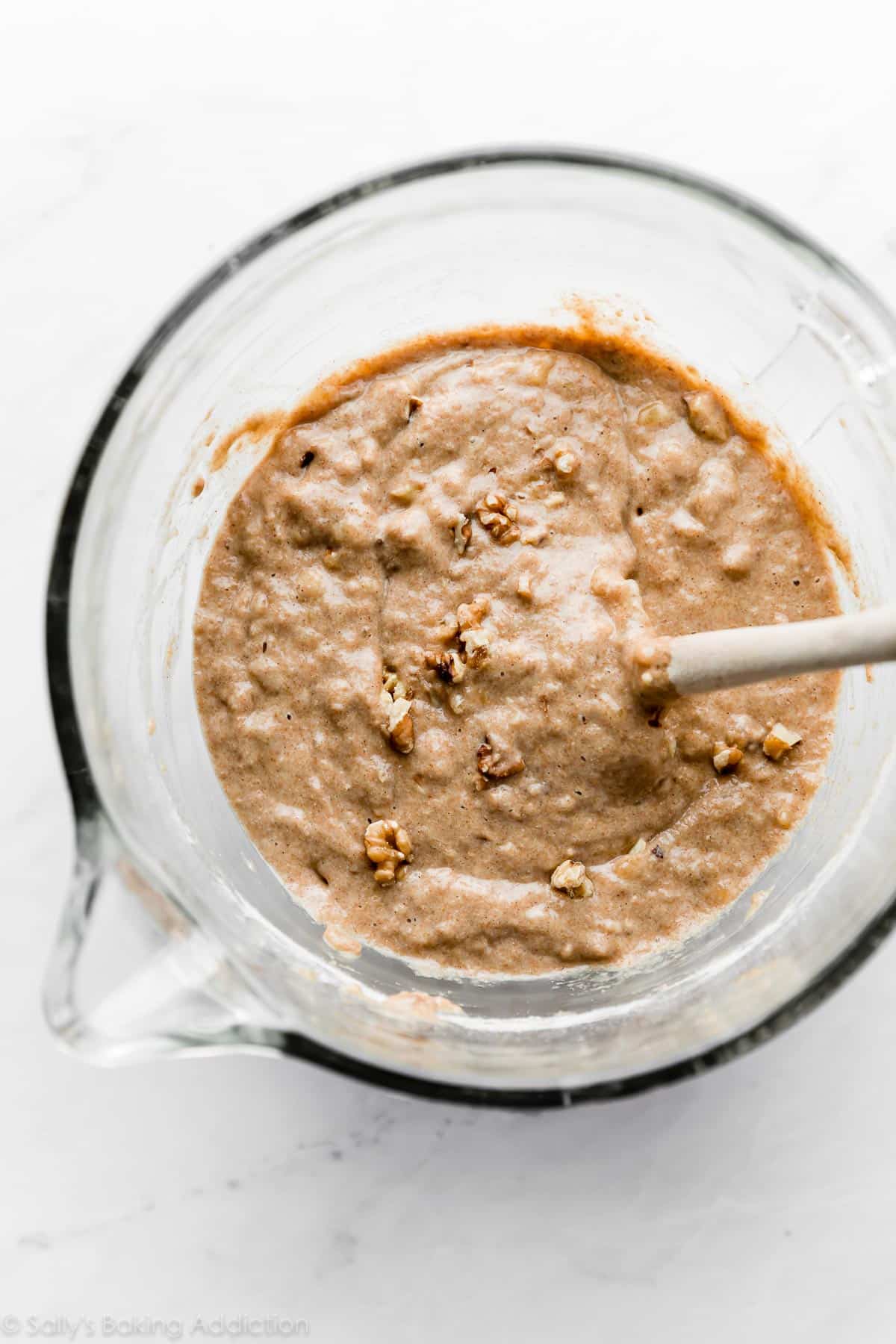 whole wheat banana bread batter in mixing bowl