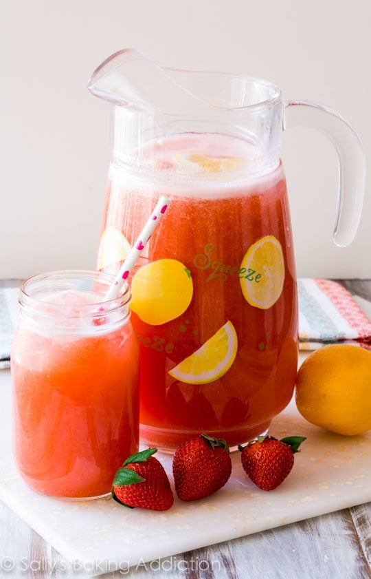 pitcher and glass of honey sweetened strawberry lemonade