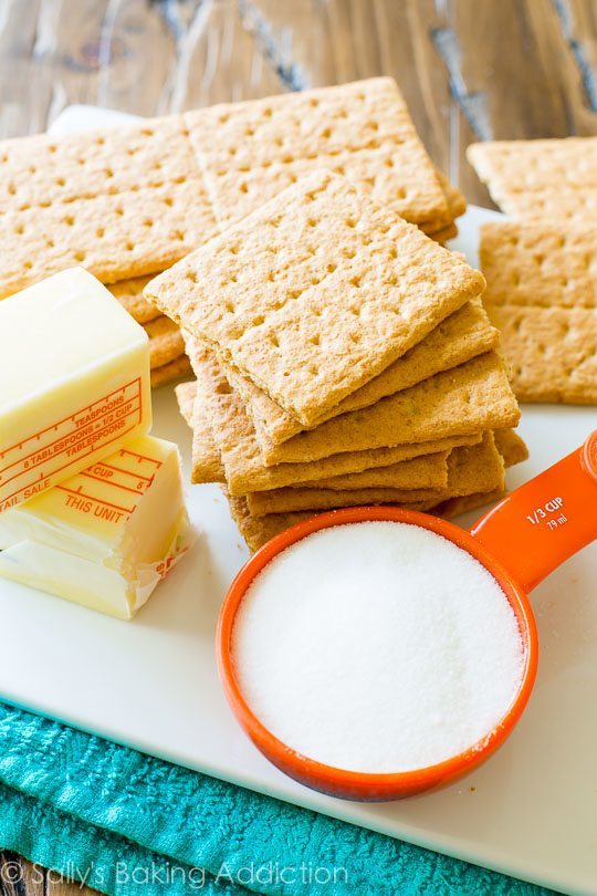 ingredients for graham cracker crust including butter, sugar, and graham crackers