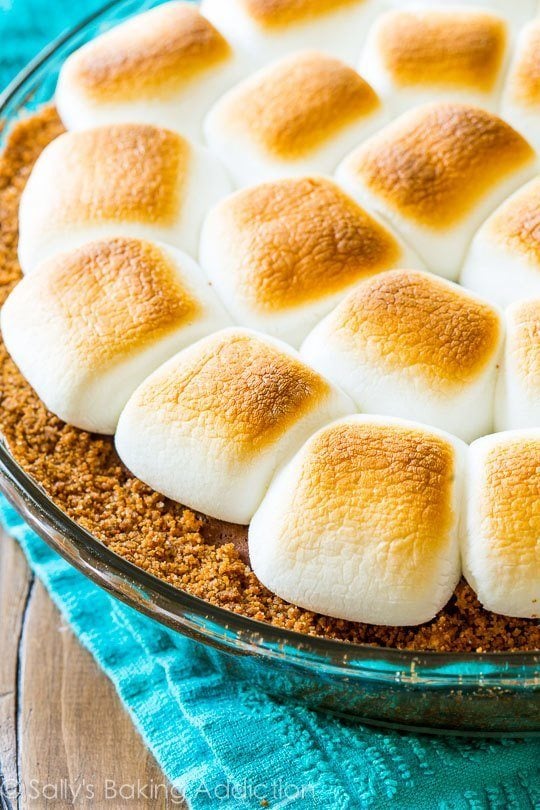 s'mores pie in a glass baking dish with a graham cracker crust