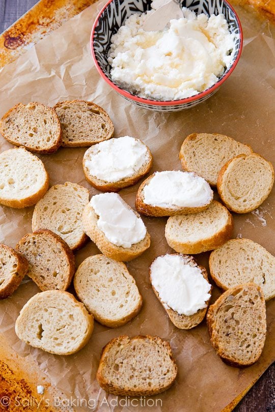 sliced bread with goat cheese spread on top