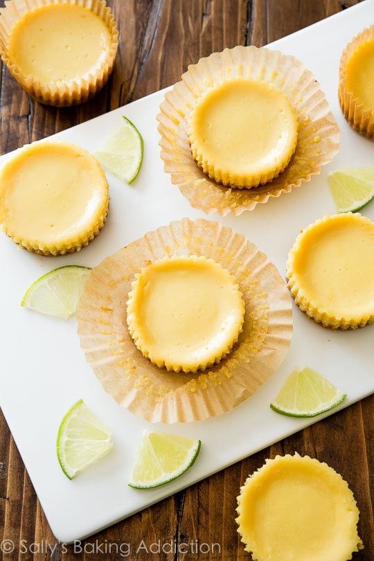 overhead image of mini key lime pies on a white serving tray