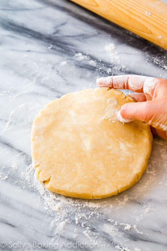 hand holding pie dough