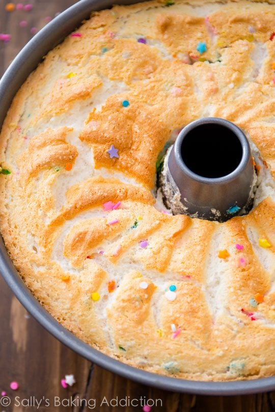 sprinkle angel food cake in a tube pan after baking
