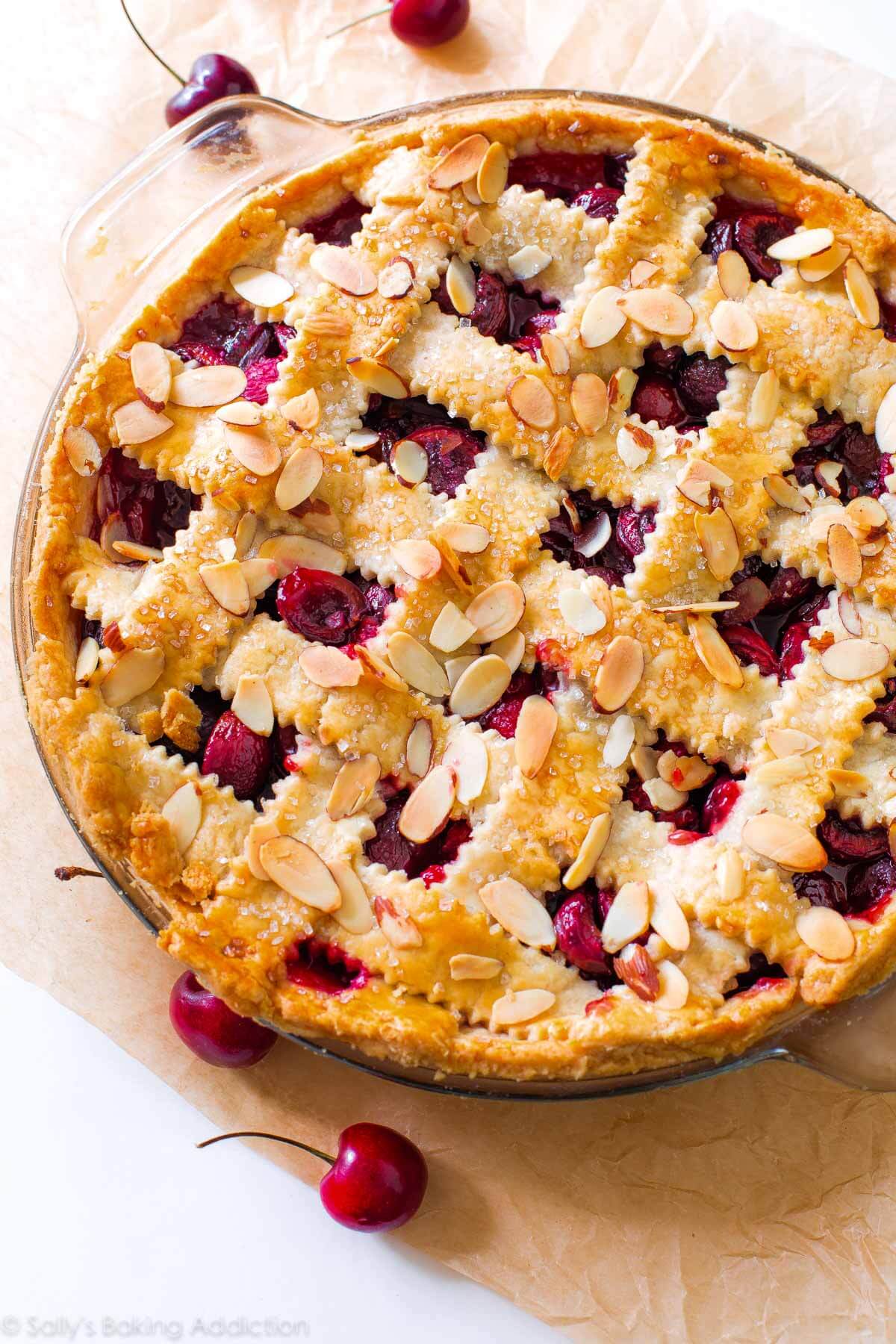 overhead image of cherry pie with toasted almonds