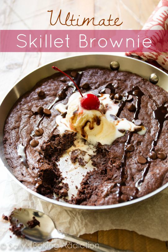 skillet brownie topped with ice cream and chocolate sauce