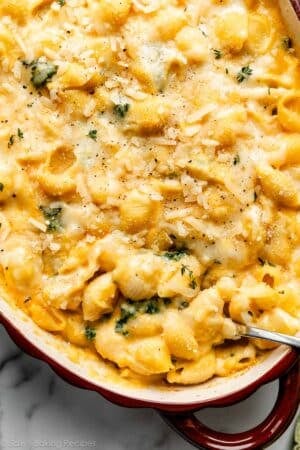 close up overhead photo of butternut squash mac and cheese with kale.