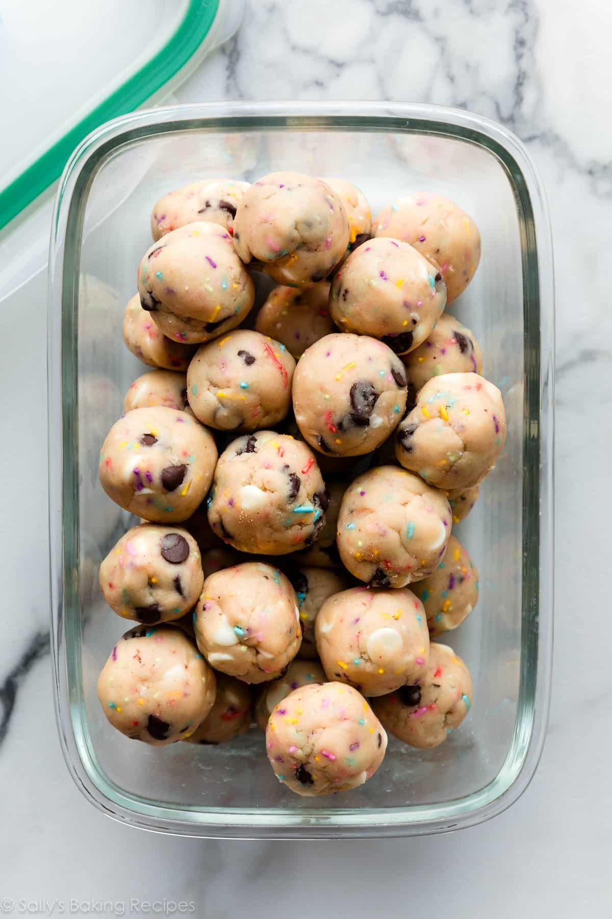birthday cake batter cookie dough balls in glass container.
