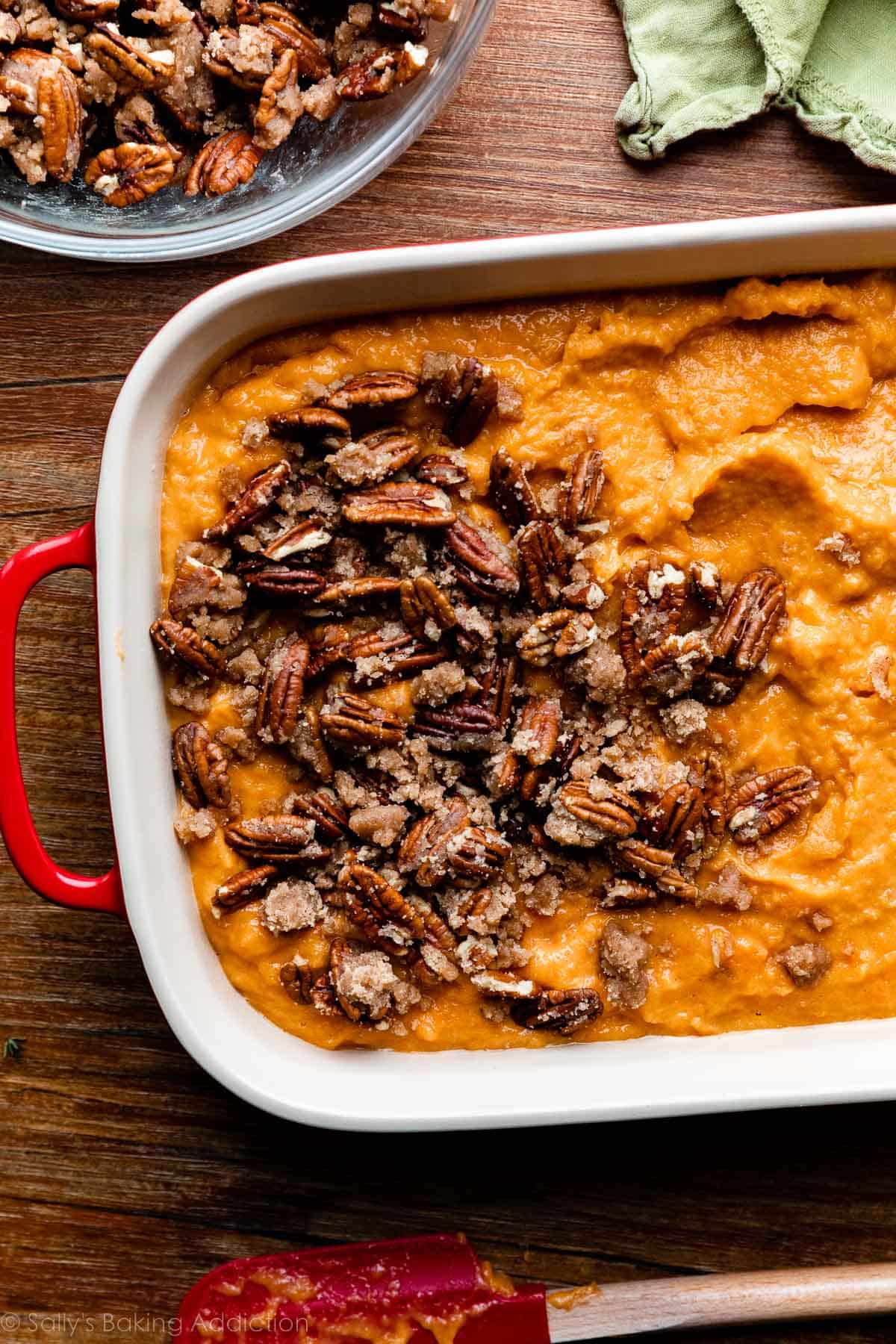 pecan crumble arranged on a portion of sweet potato blender puree.