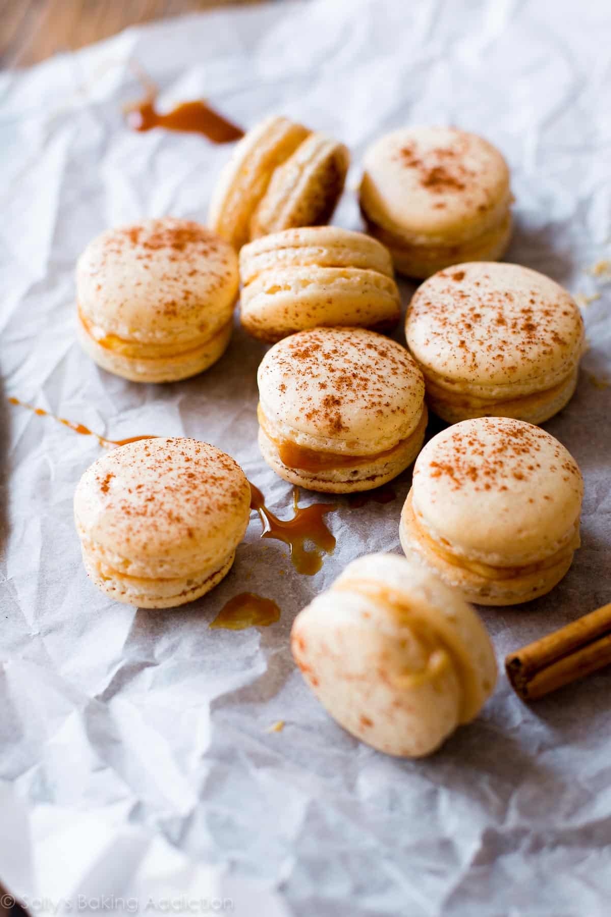 salted caramel cinnamon macarons on parchment paper