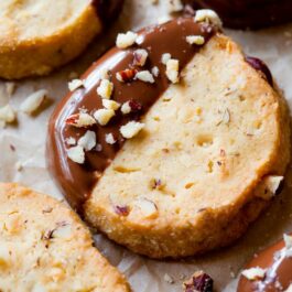 toasted hazelnut slice and bake cookies with half of each cookie dipped in milk chocolate