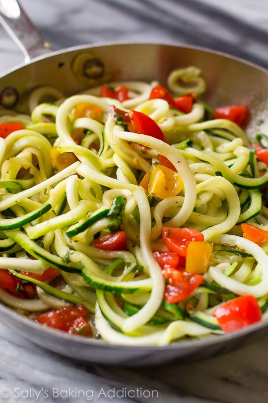 zucchini noodles and vegetables in a skillet