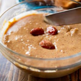 maple roasted almond butter in a glass bowl