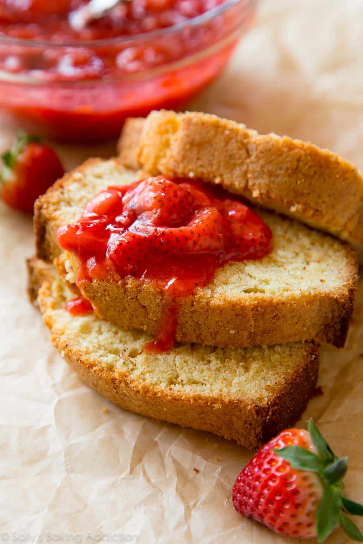 slices of brown butter pound cake topped with strawberry compote