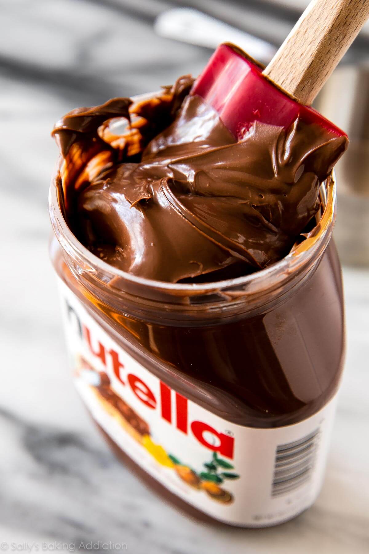 Nutella container with a red spatula
