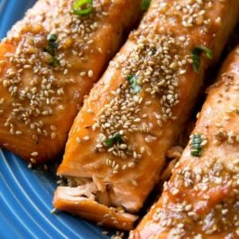 easy maple sesame salmon on a blue plate