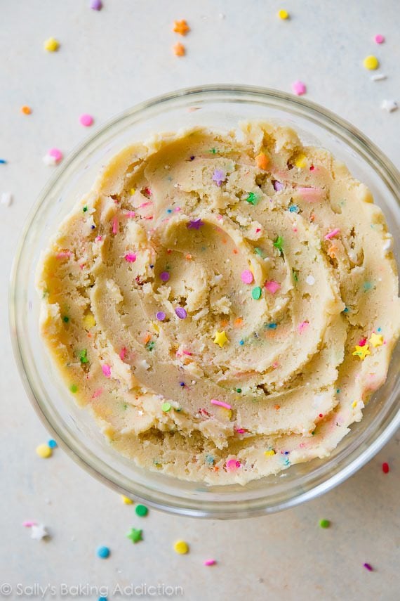 sugar cookie dough in a glass bowl with sprinkles