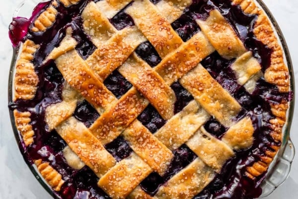 blueberry pie with lattice pie crust.