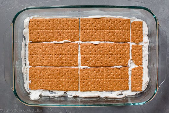 layer of graham crackers in a glass baking dish