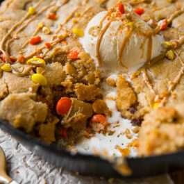 peanut butter skillet cookie topped with ice cream