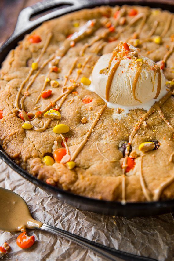 peanut butter skillet cookie topped with ice cream