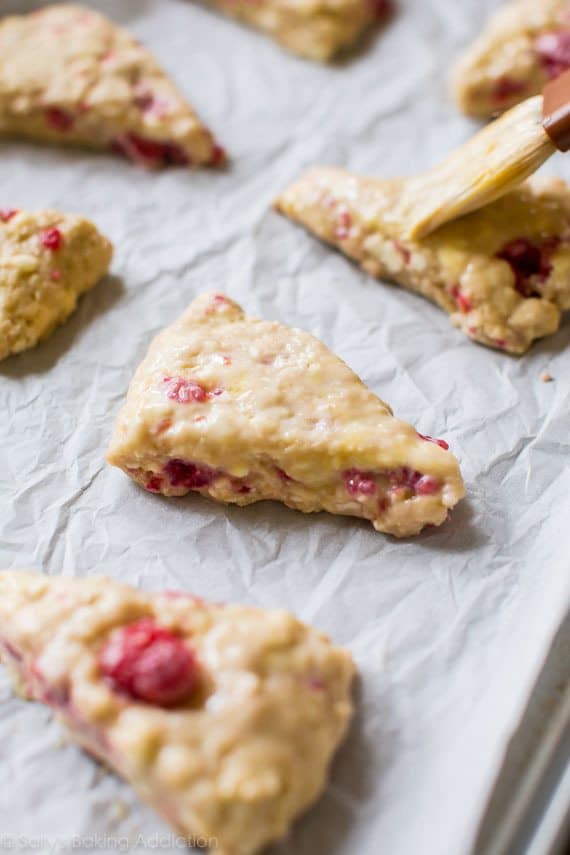 raspberry almond buttermilk scones on a baking sheet before baking