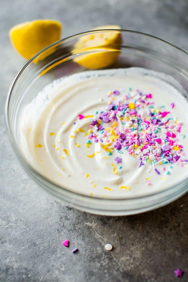 popsicle yogurt mixture with sprinkles in a glass bowl