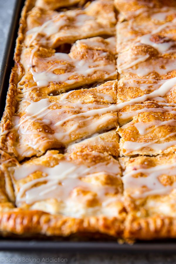 apple slab pie with maple icing in a baking pan