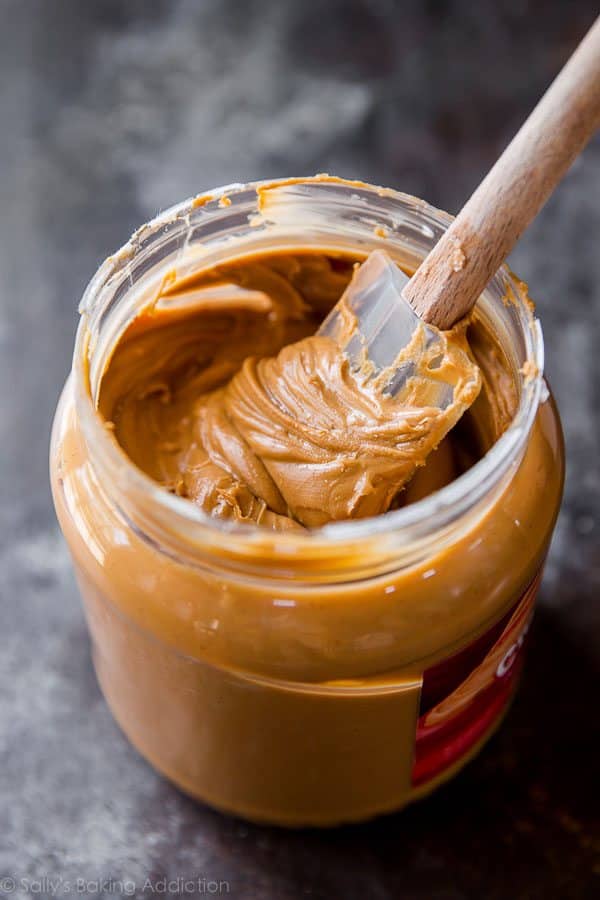 peanut butter in a jar with a spatula