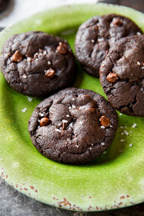 salted dark chocolate cookies on a green plate