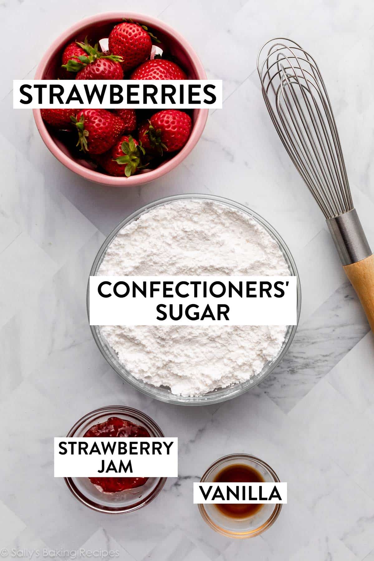 ingredients on counter including confectioners' sugar, strawberries, jam, and vanilla.