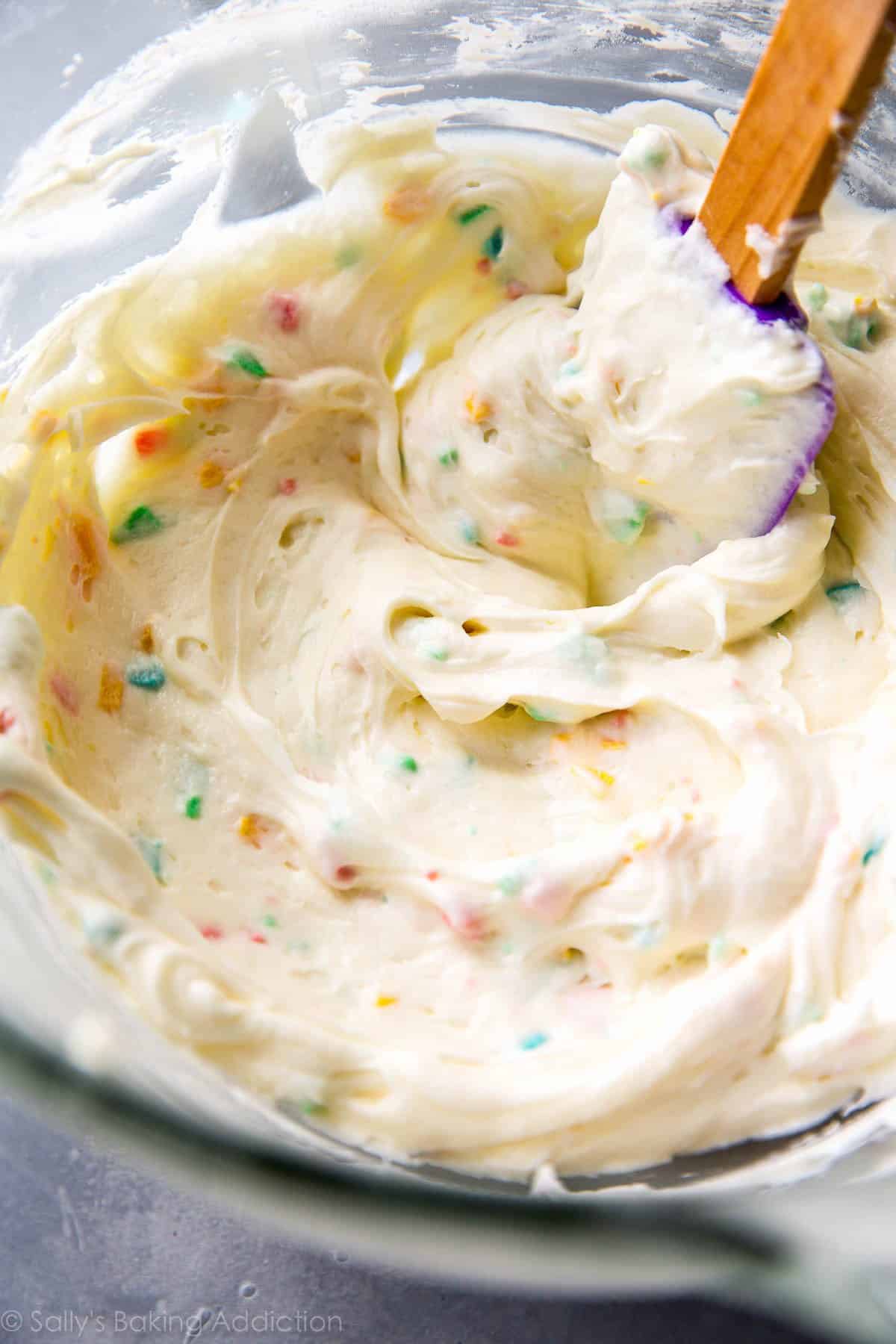rainbow chip frosting in a glass bowl