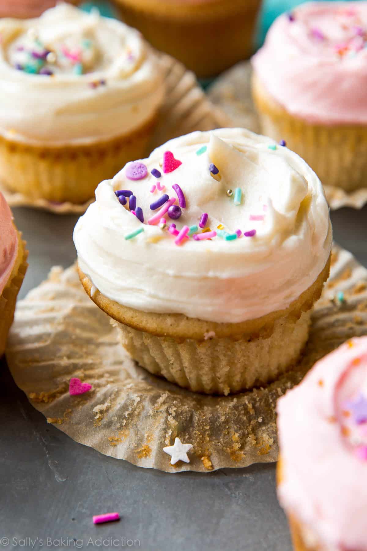 vanilla cupcakes with vanilla buttercream and sprinkles