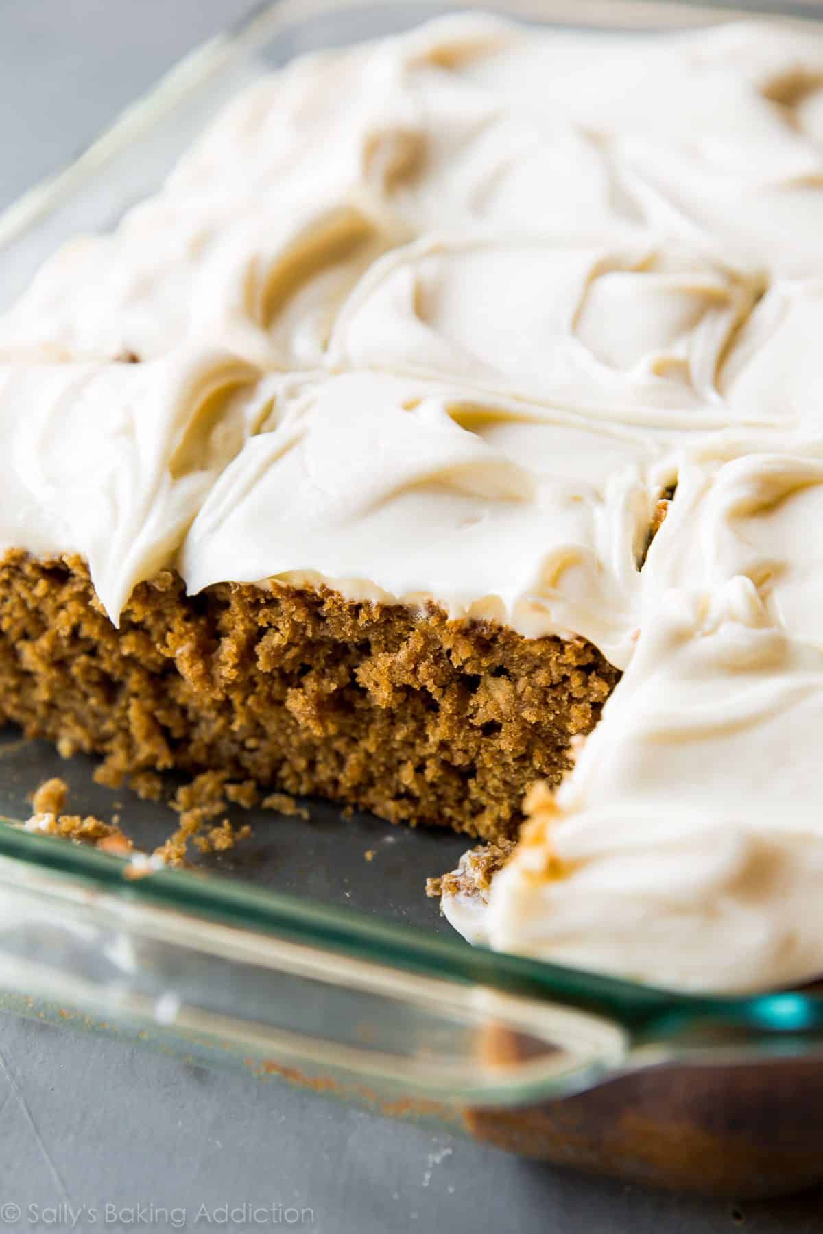 spice cake with cream cheese frosting in a glass baking dish
