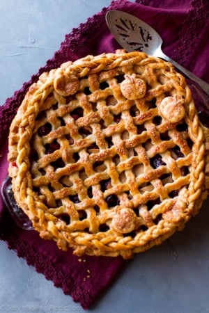 overhead image of apple cranberry pie with latticed pie crust after baking